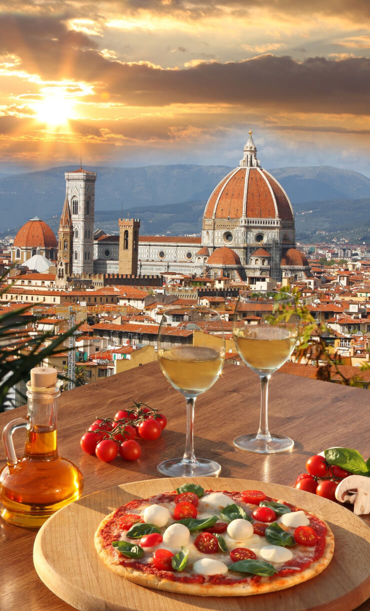 Florence, view of the Duomo and wine in the spotlight