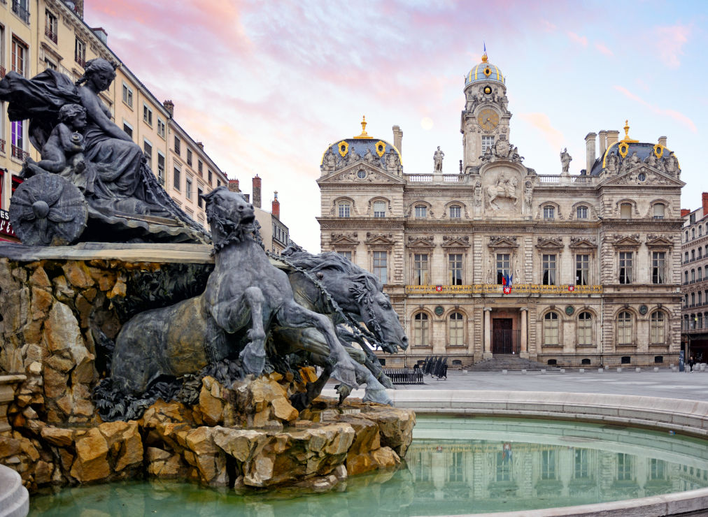 Fontaine Bartholdi and Lyon City Hall on the Place des Terreaux square in Lyon.