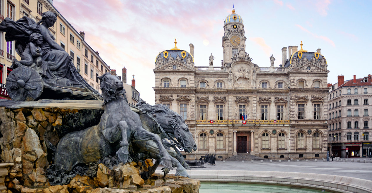 Fontaine Bartholdi and Lyon City Hall on the Place des Terreaux square in Lyon.